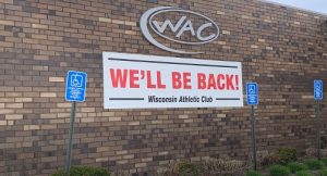 The WAC delivering a message via a large outdoor banner