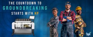 3 Construction Workers in high definition light on a blue background. Heading that says "The Countdown to Groundbreaking Begins with HP" with an HP wide format T2600 printer.