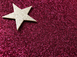 Red glitter background with gold star