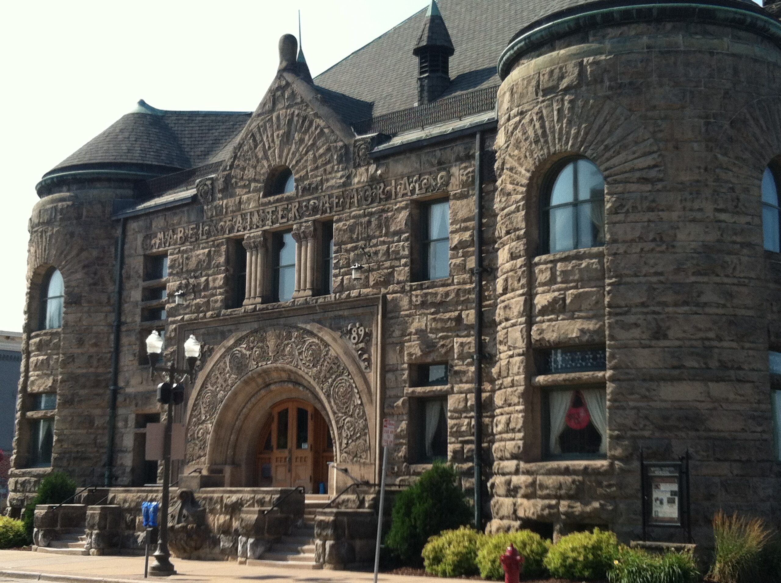 Mabel Tainter Theater. A sandstone building built in the Richardsonian Romanesque architectural style.