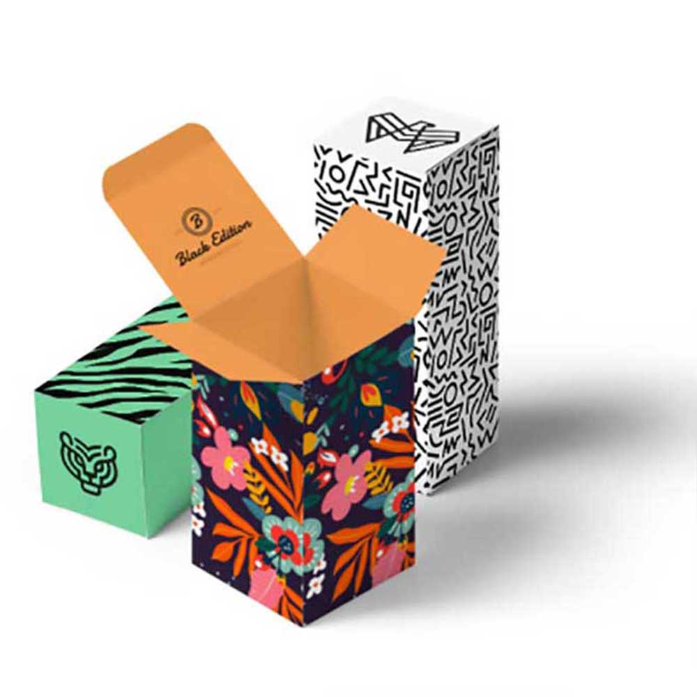 Three examples of small, custom branded product boxes.